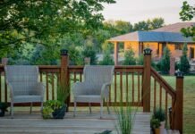 6 Ways to Transform Your Outdoor Living Space wooden porch with two armchairs