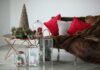 How to Redecorate Your Home for Winter A living room decorated with Christmas decor.